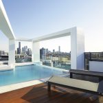 Omega Apartments rooftop pool overlooking Brisbane's CBD (image supplied by the developer)