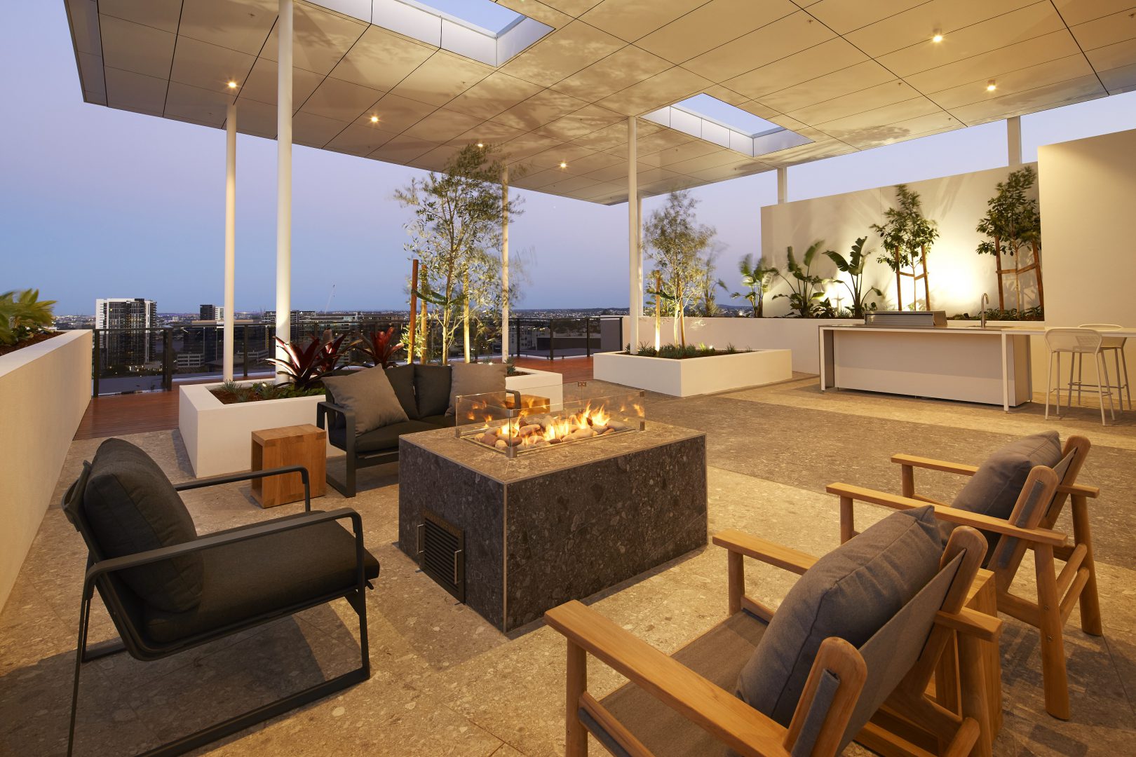 Omega Apartments rooftop recreational area with solar-powered subtropical garden, gas fire pit and bbqs (image supplied by the developer)